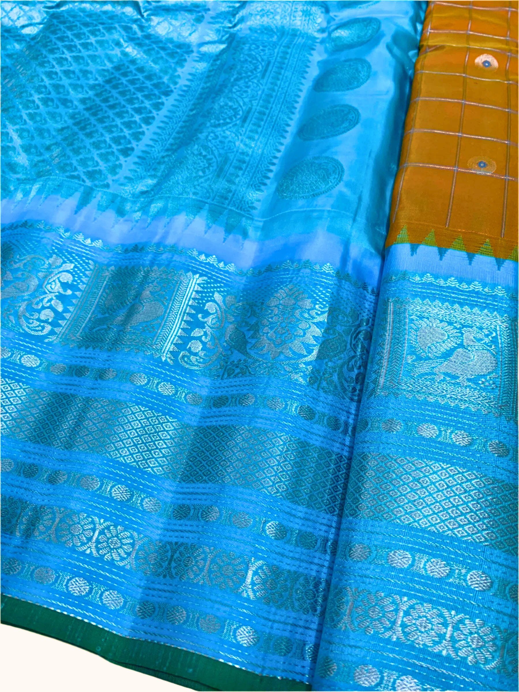 Orange and Cyan Gadwal Silk Saree with Silver Zari