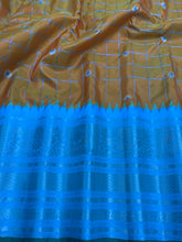 Load image into Gallery viewer, Orange and Cyan Gadwal Silk Saree with Silver Zari