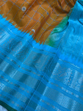 Load image into Gallery viewer, Orange and Cyan Gadwal Silk Saree with Silver Zari