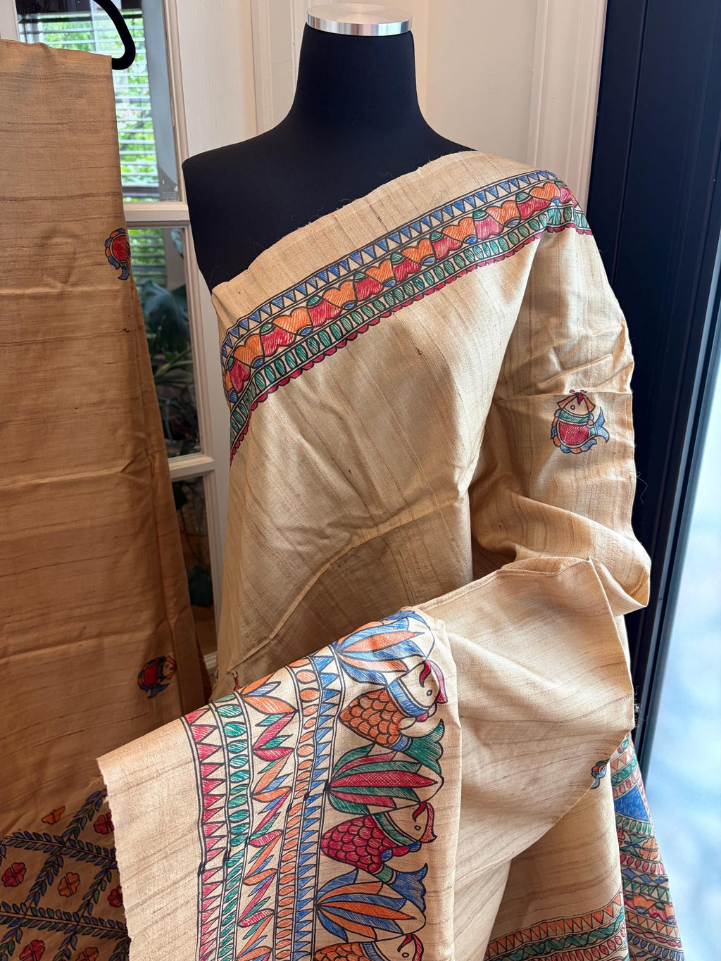 Beige Tussar Silk Saree with Madhubani Painted Border