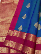 Peacock Blue Kanchipuram Silk Saree with Magenta Korvai Border