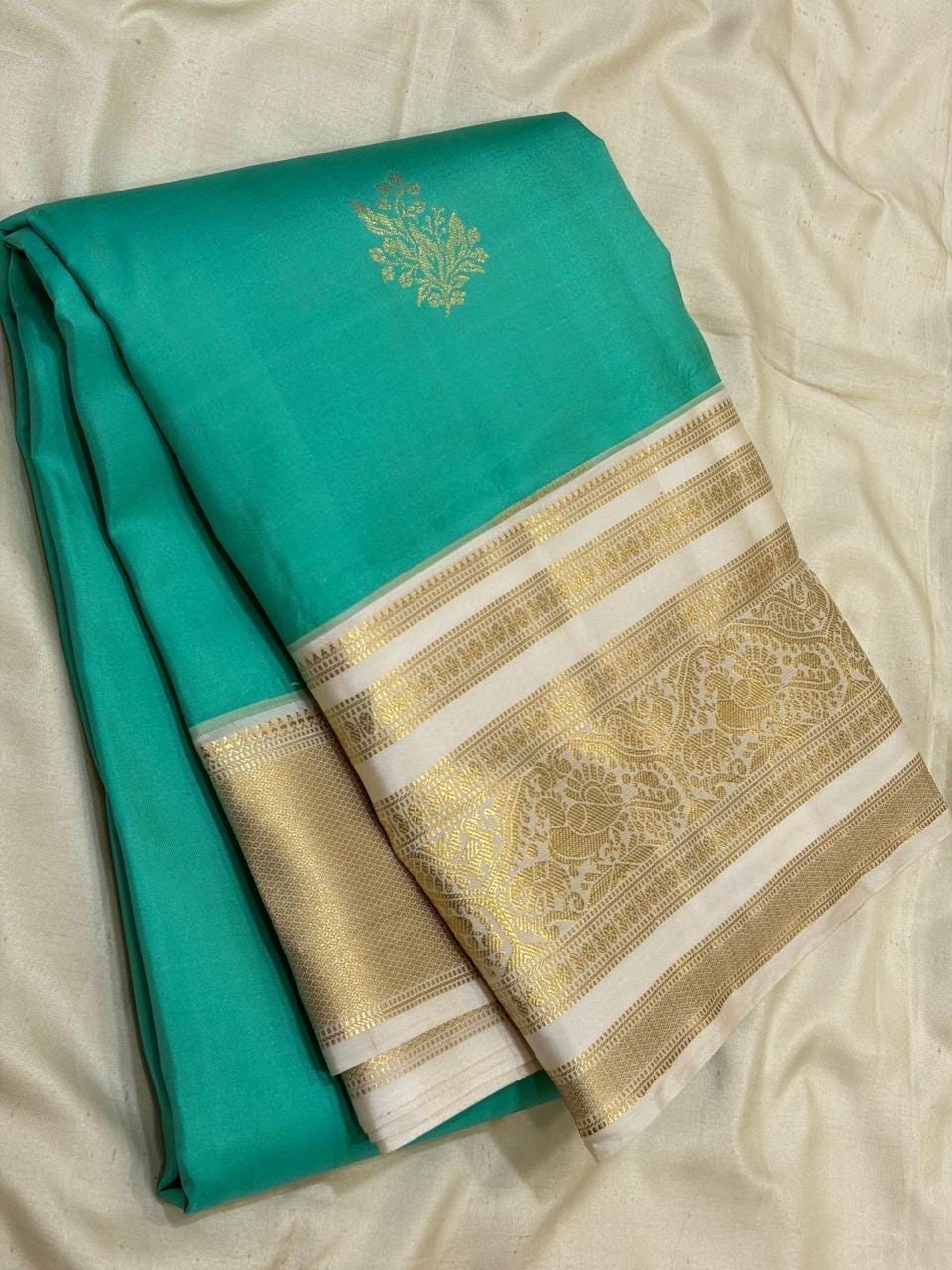 Sea Green Kanchipuram Silk Saree with Gold Zari Border