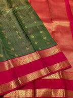 Bottle Green Kanchipuram Silk Saree with Rani Pink Korvai Border
