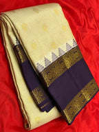 Cream Kanchipuram Silk Saree with Navy Korvai Border