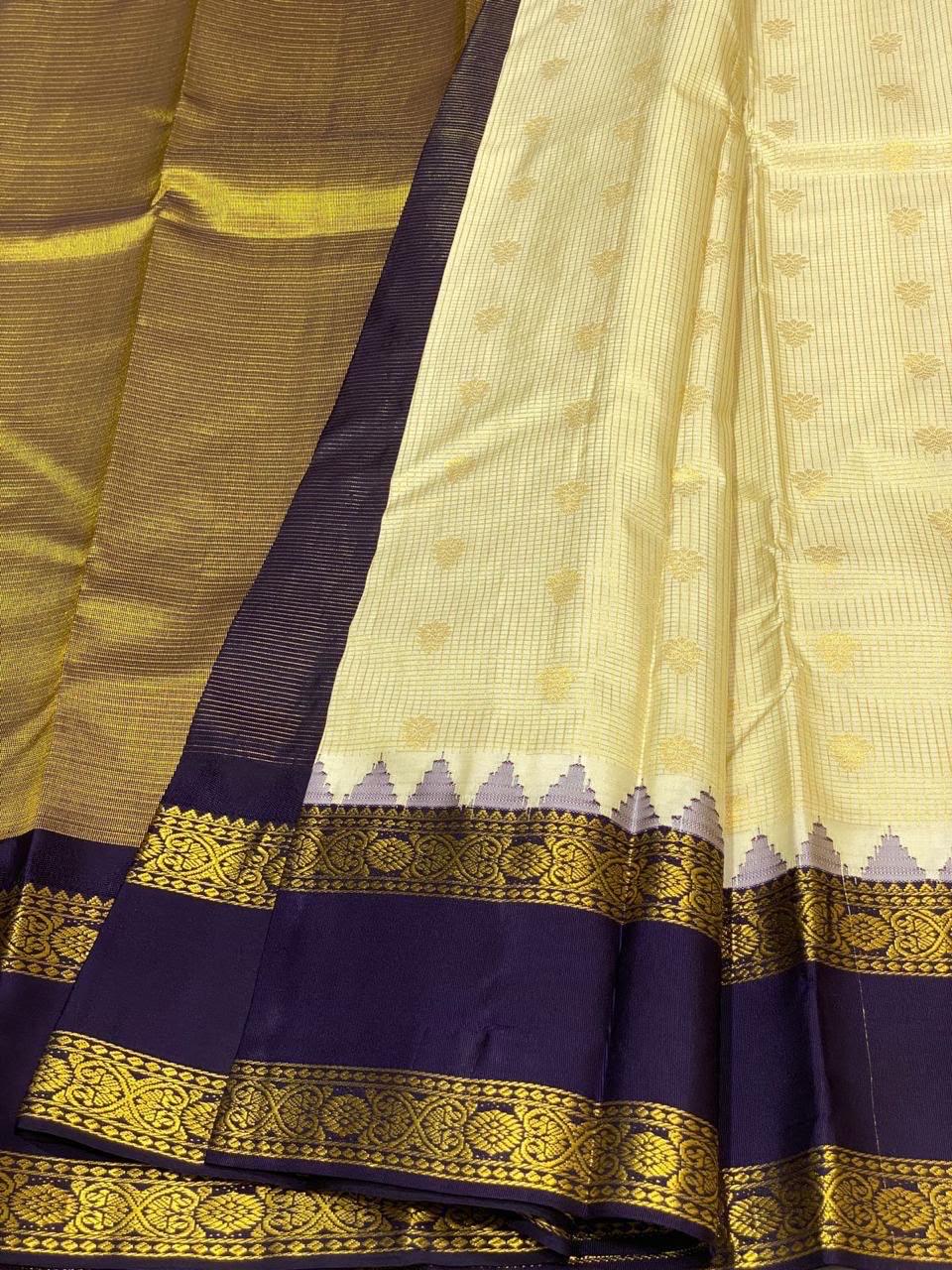 Cream Kanchipuram Silk Saree with Navy Korvai Border
