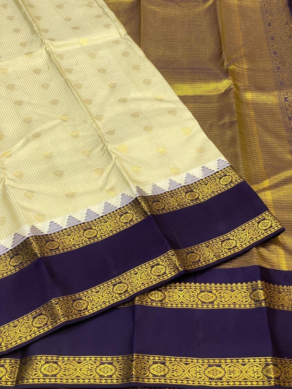 Cream Kanchipuram Silk Saree with Navy Korvai Border