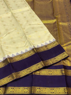Cream Kanchipuram Silk Saree with Navy Korvai Border