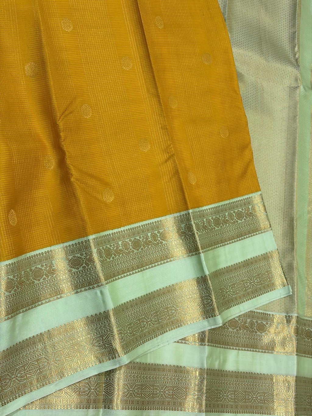 Mustard Yellow Kanchipuram Silk Saree with Pastel Mint Border