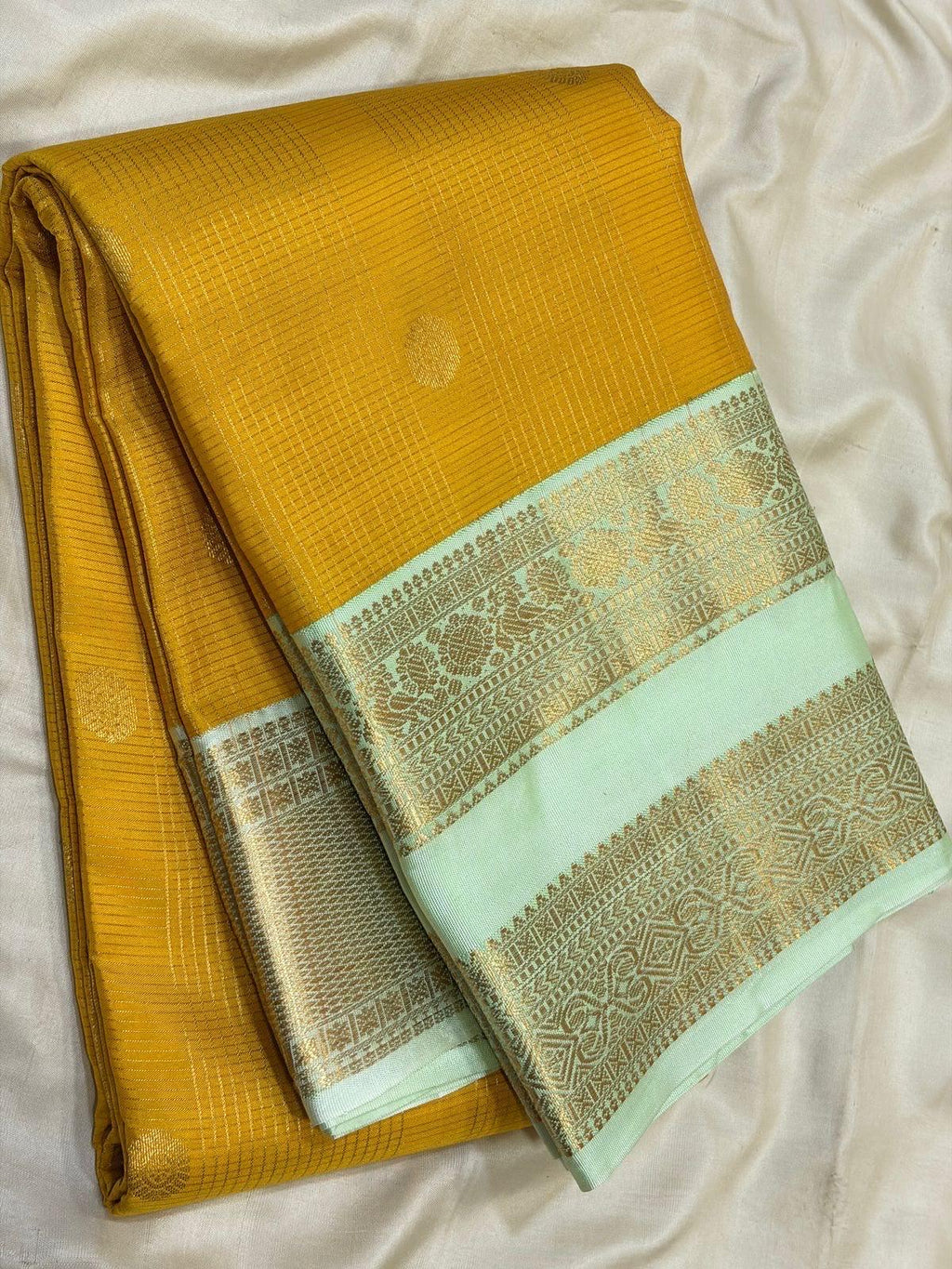 Mustard Yellow Kanchipuram Silk Saree with Pastel Mint Border