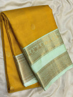 Mustard Yellow Kanchipuram Silk Saree with Pastel Mint Border