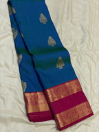 Peacock Blue Kanchipuram Silk Saree with Magenta Korvai Border