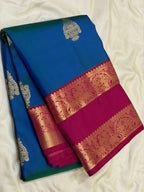 Peacock Blue Kanchipuram Silk Saree with Magenta Korvai Border