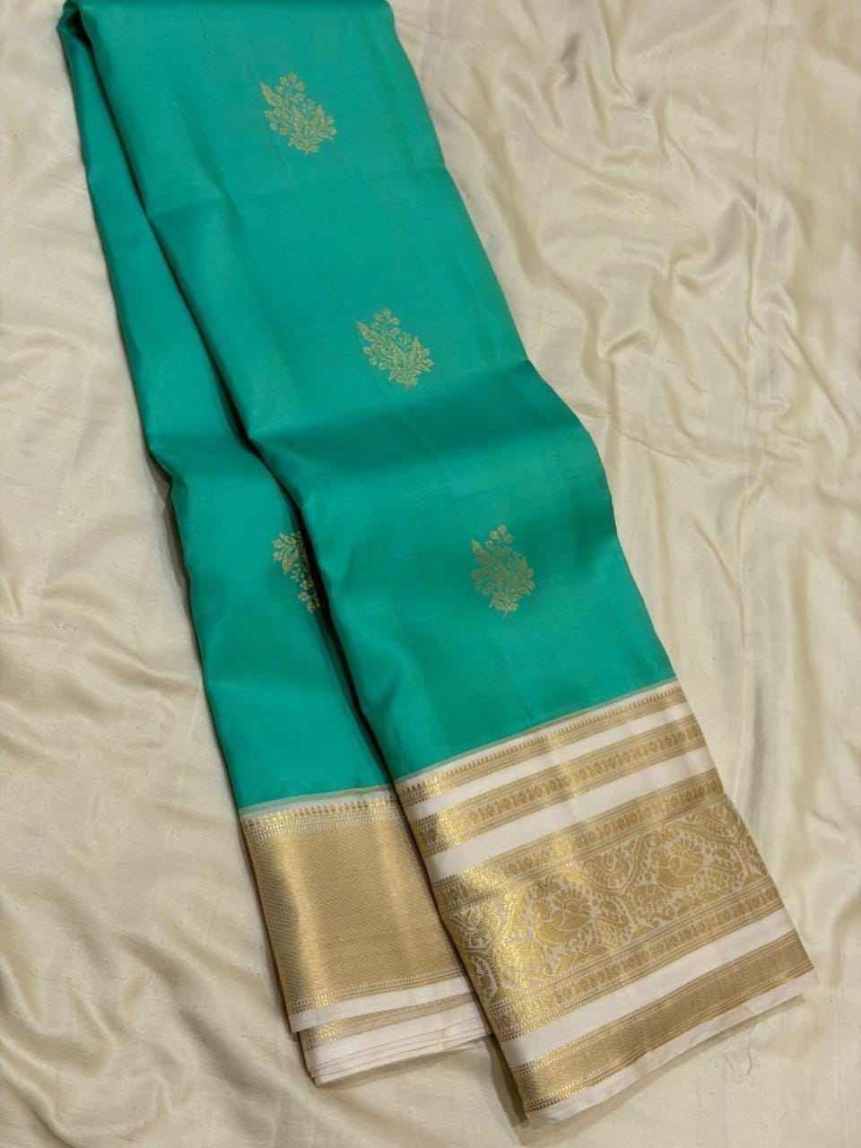 Sea Green Kanchipuram Silk Saree with Gold Zari Border