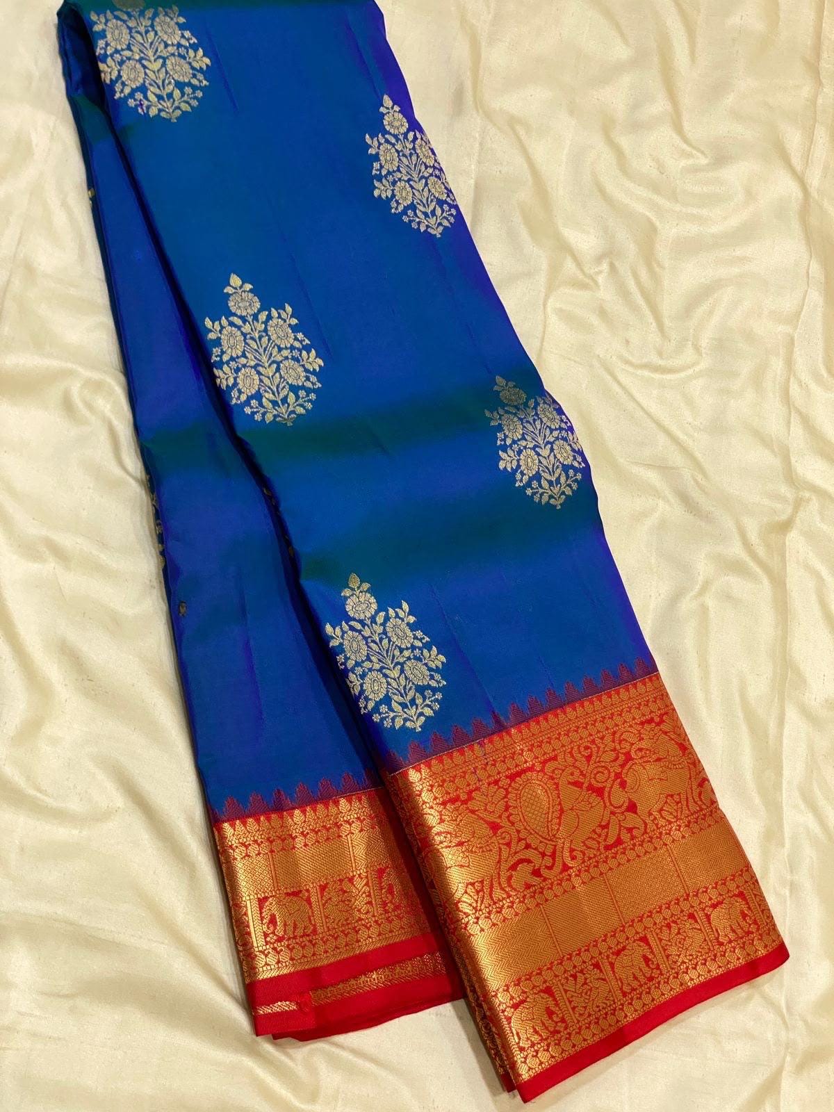 Royal Blue Kanchipuram Silk Saree with Red Korvai Border