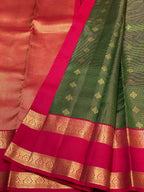 Bottle Green Kanchipuram Silk Saree with Rani Pink Korvai Border