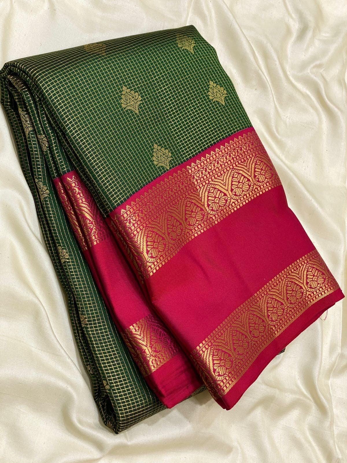Bottle Green Kanchipuram Silk Saree with Rani Pink Korvai Border