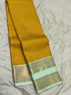 Mustard Yellow Kanchipuram Silk Saree with Pastel Mint Border
