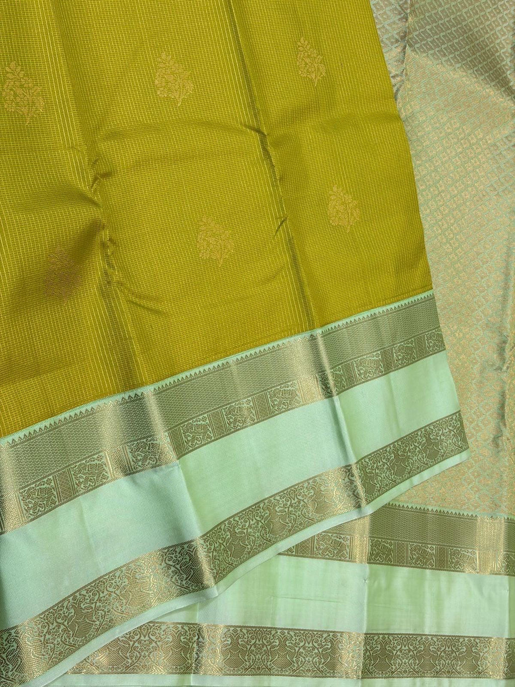 Leaf Green Kanchipuram Silk Saree with Pastel Mint Border
