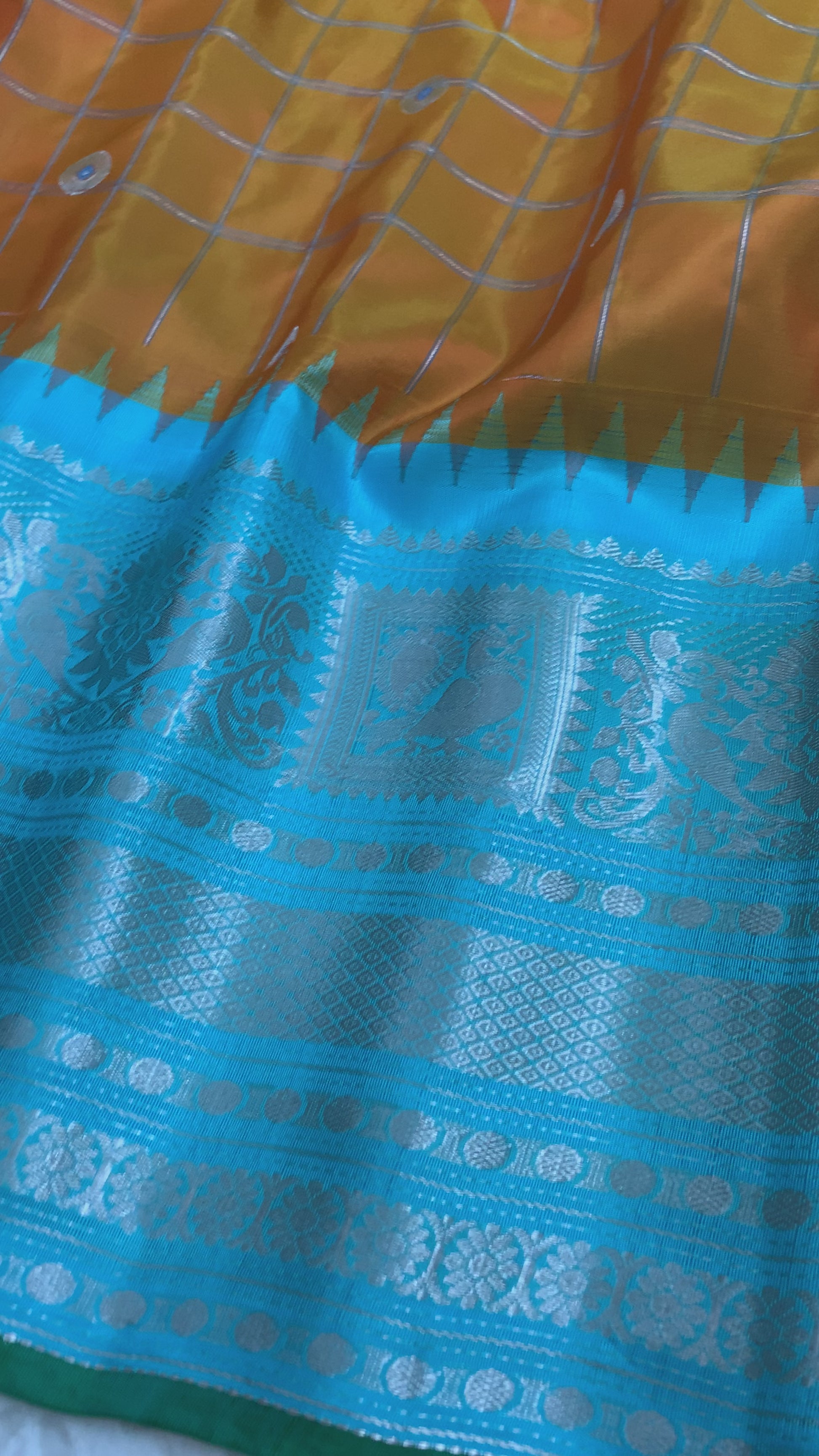 Orange and Cyan Gadwal Silk Saree with Silver Zari